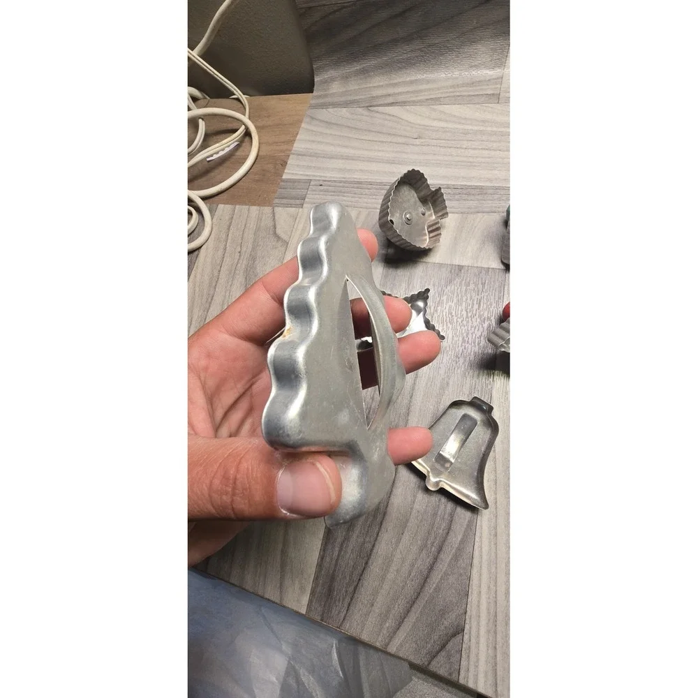 Set Of 8 vintage aluminum cookie cutters